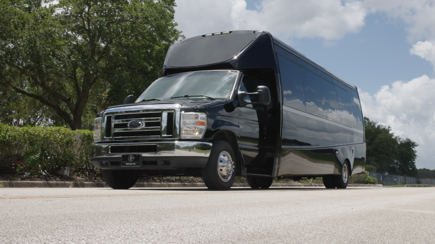 24-Passenger Executive Mini Coach waiting next the University Air Center Private Airport in Gainesville Florida