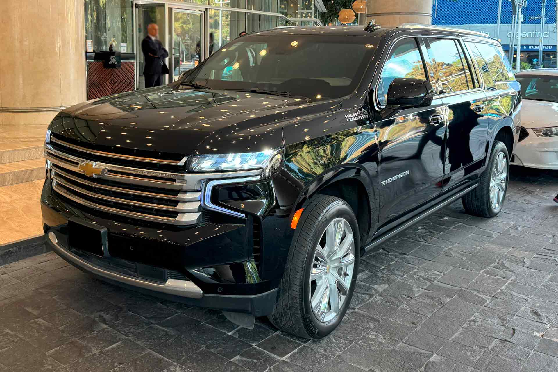 Chevrolet Suburban High Country luxury SUV providing executive black car transportation for airport transfers, corporate travel, and VIP chauffeur service.