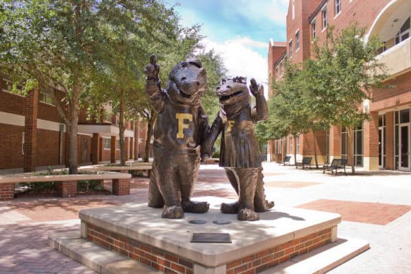 Albert and Alberta Gator statues on the University of Florida campus in Gainesville, Florida, representing UF student life and campus traditions.