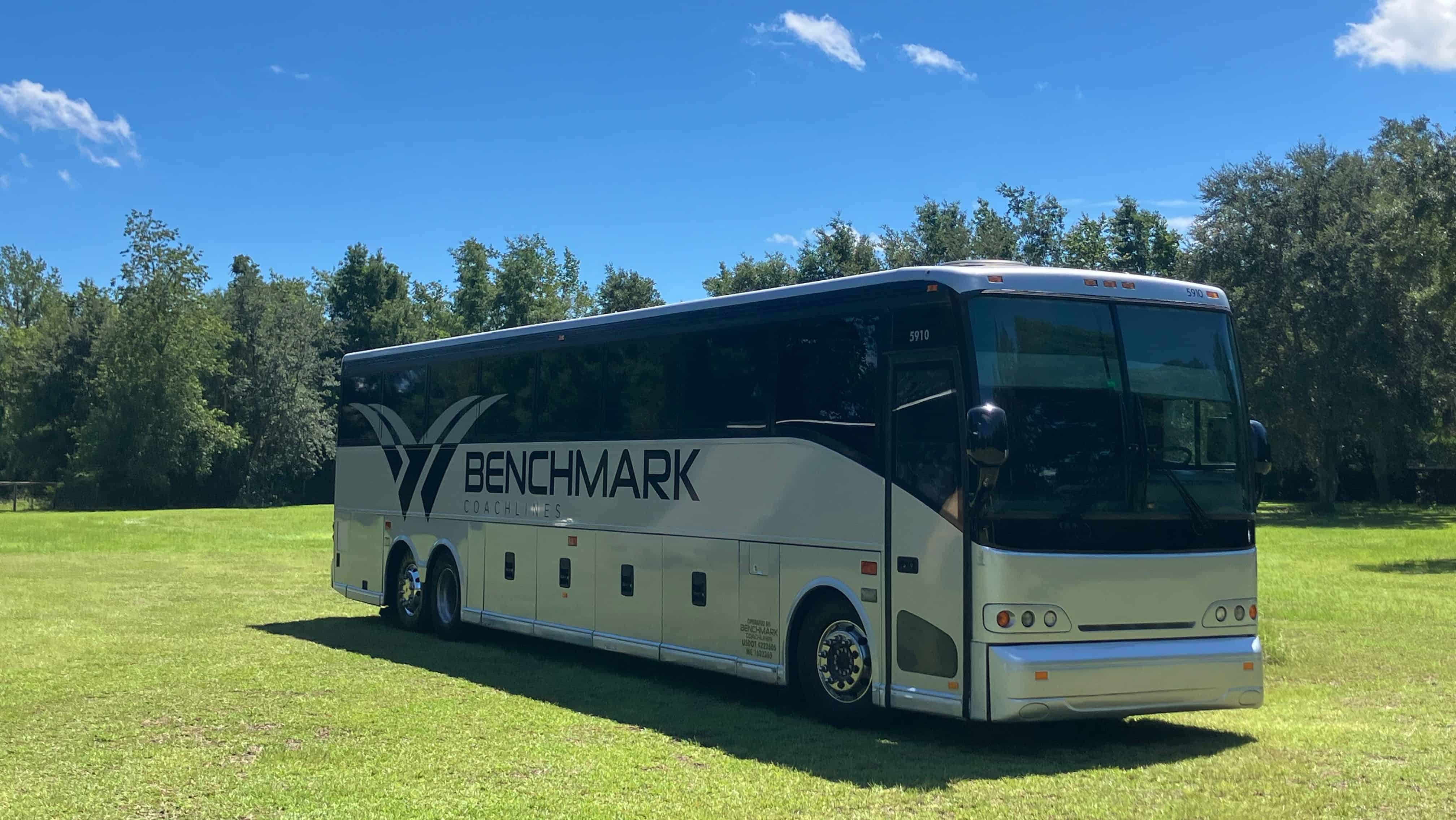 Benchmark Coachlines charter bus parked at wedding venue – luxury wedding transportation service in Florida