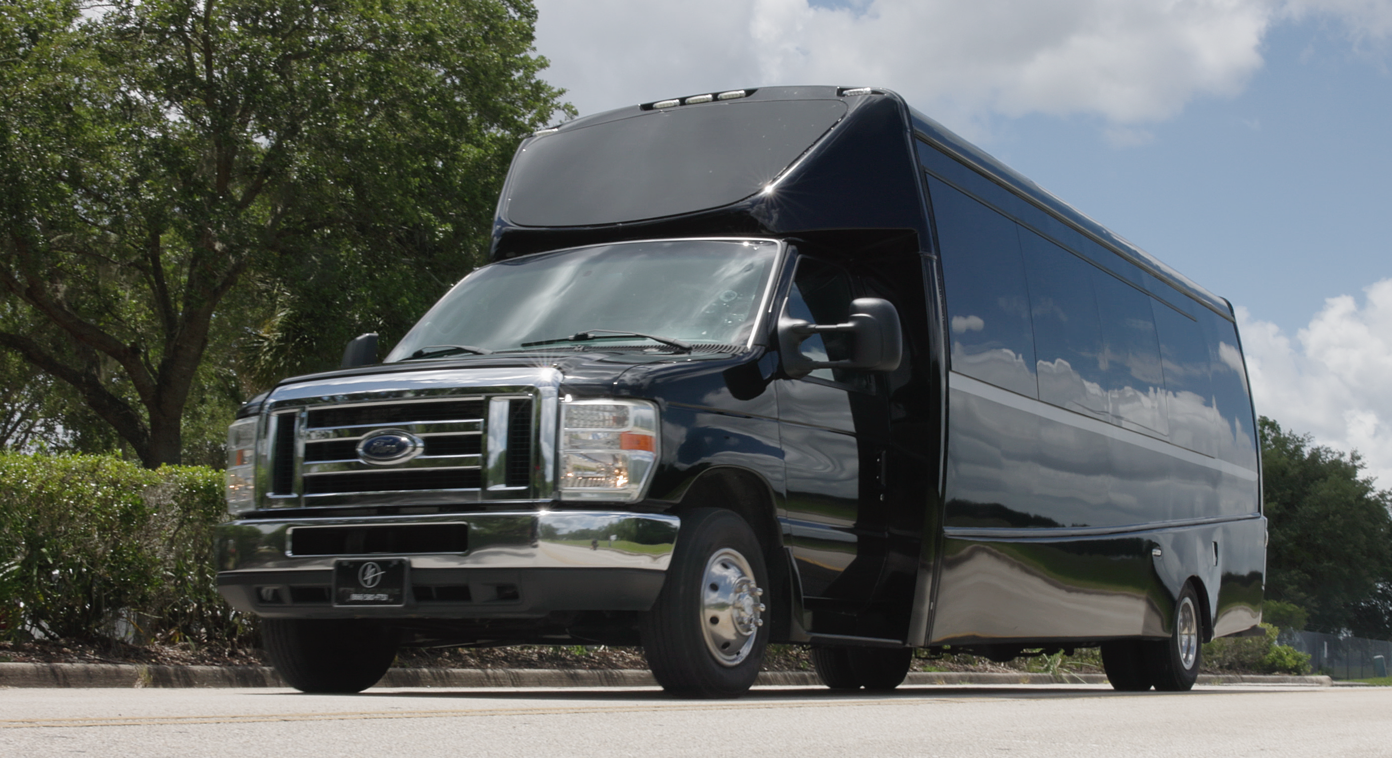 24-passenger executive shuttle bus waiting at University Air Center in Gainesville FL for private jet passengers