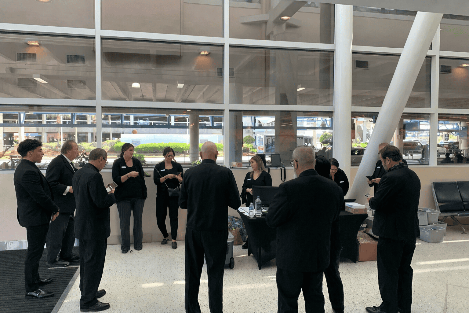 FTS dispatch team and chauffeurs meeting at Jacksonville International Airport to prepare for a business executive group arrival during the Players Championship PGA Tour week.