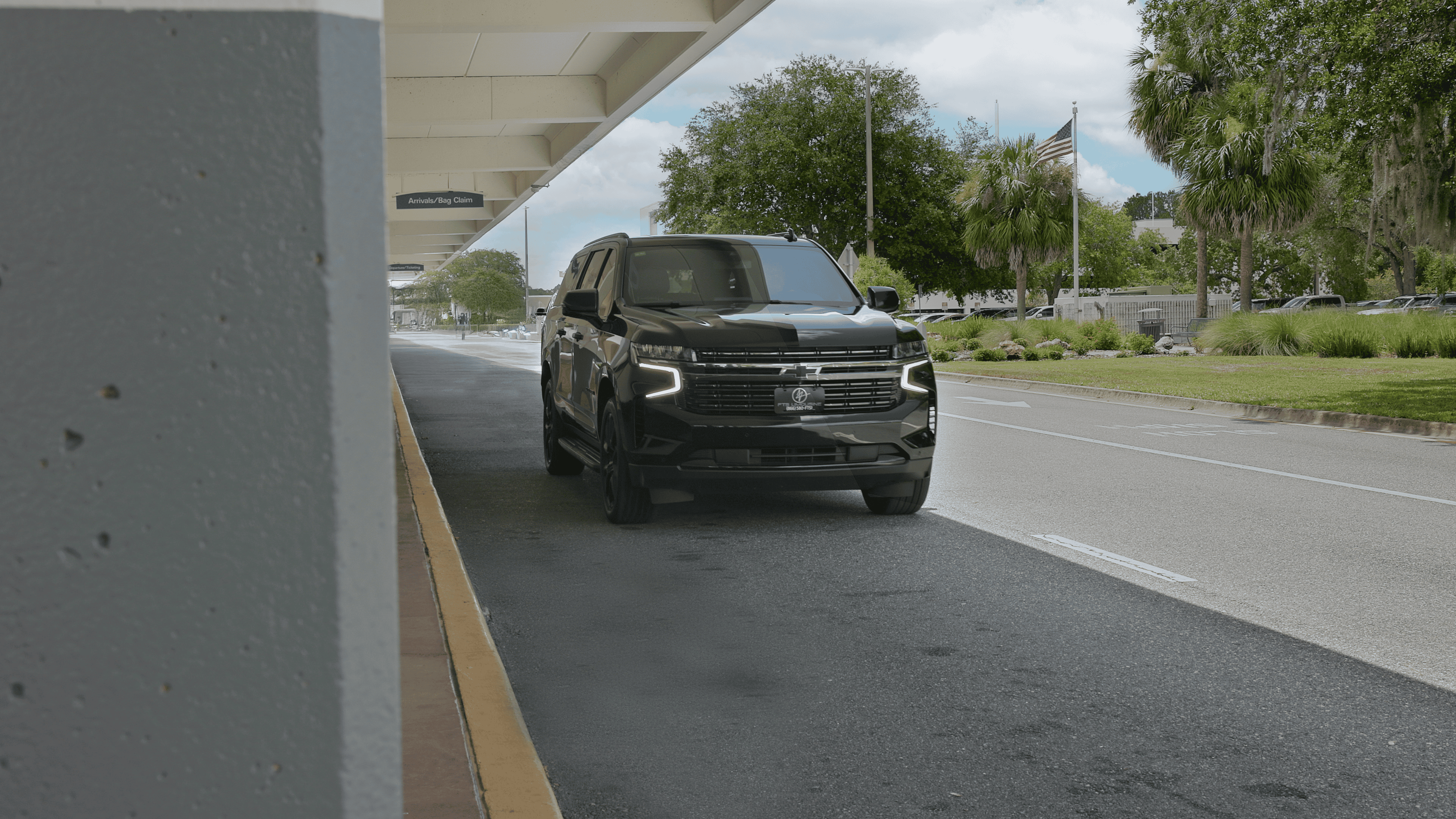 Luxury black SUV providing airport car service at Gainesville Regional Airport in Gainesville, Florida.