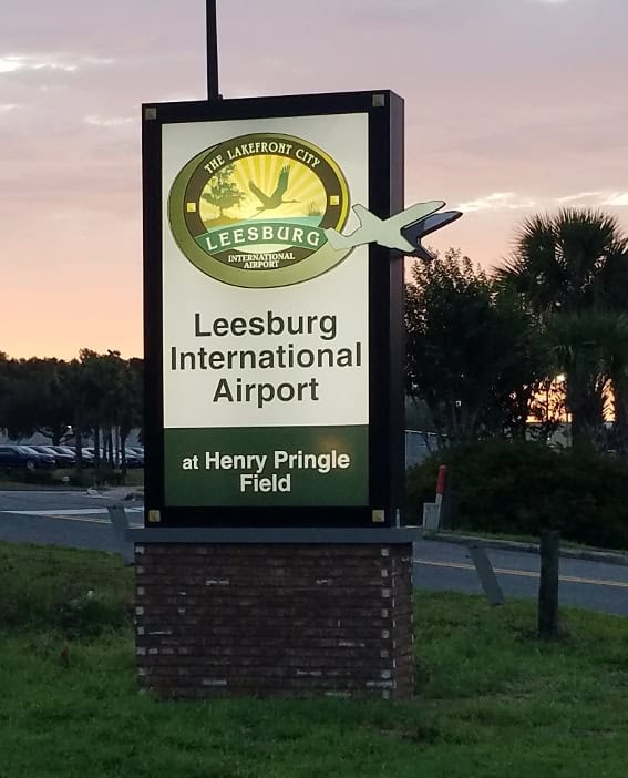 Entrance sign for Leesburg International Airport in Leesburg, Florida.